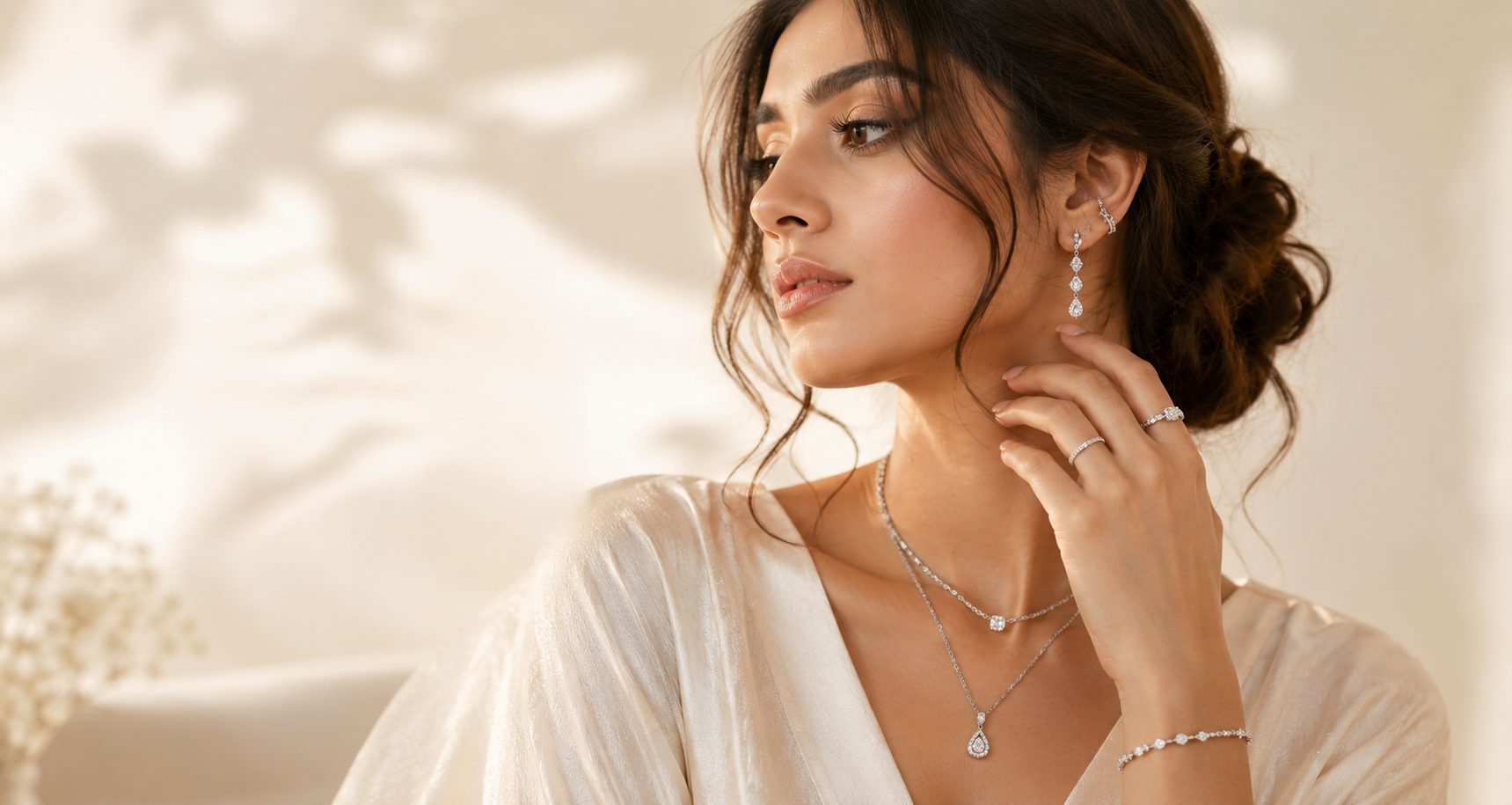 Dilaavez jewellery styled with layered necklaces, drop earrings and stacked rings
